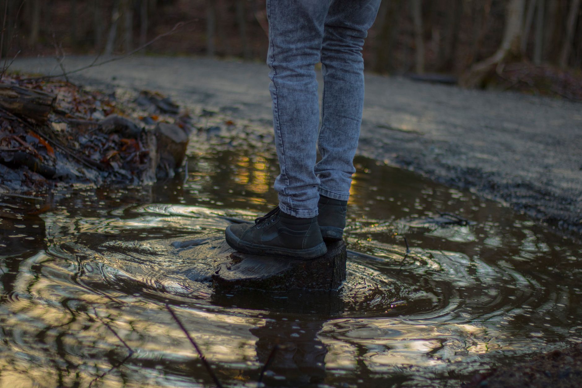 Muddy boots and gaiters on Hadrian's Wall Path in April, showing typical early spring underfoot conditions