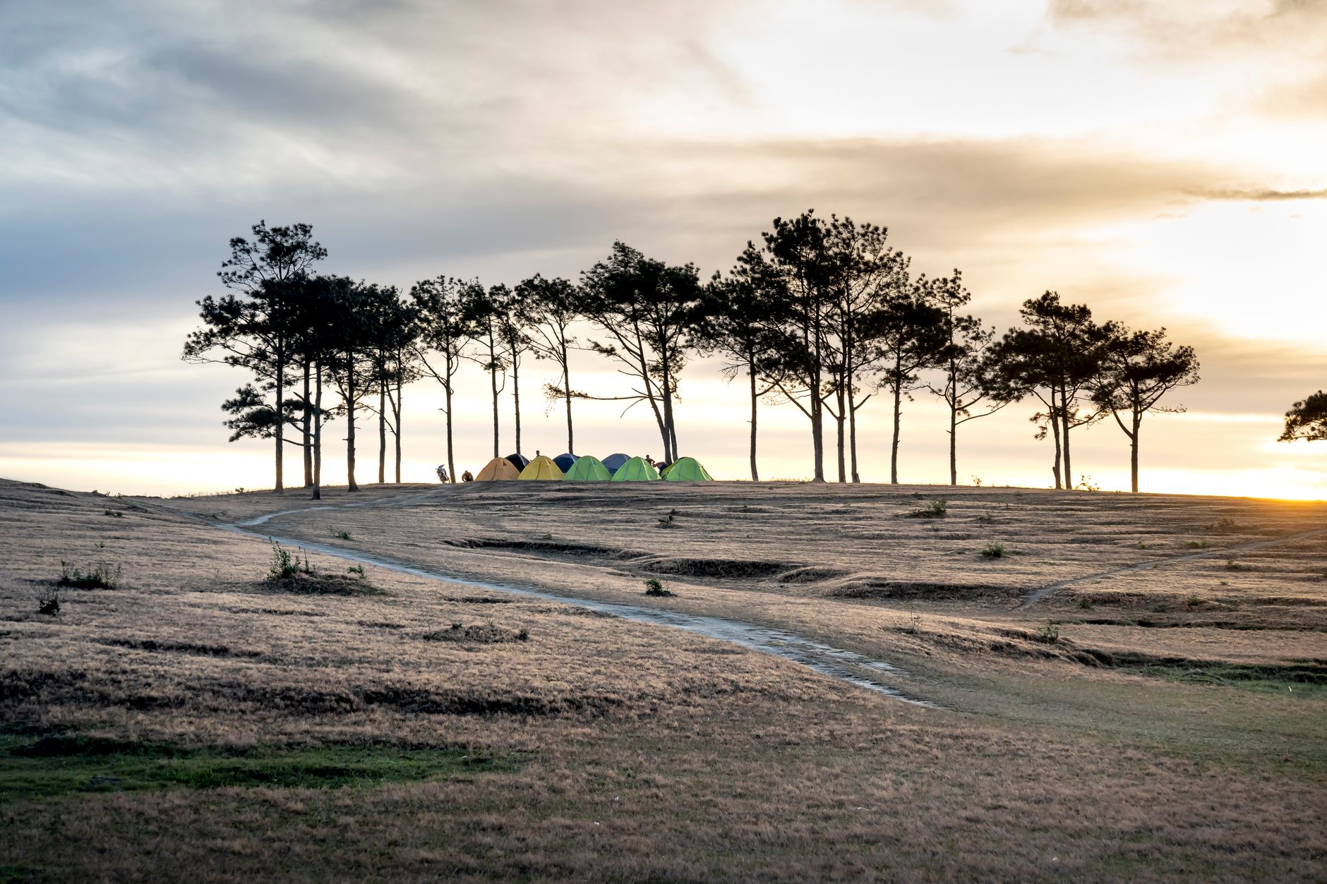 Backpacking tent pitched on a UK highland ridge at dusk — a wild camping checklist essential